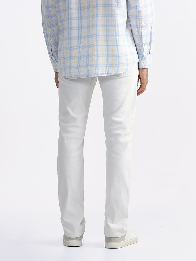 Buy Ascot Solid Relaxed Fit White Jeans from Westside