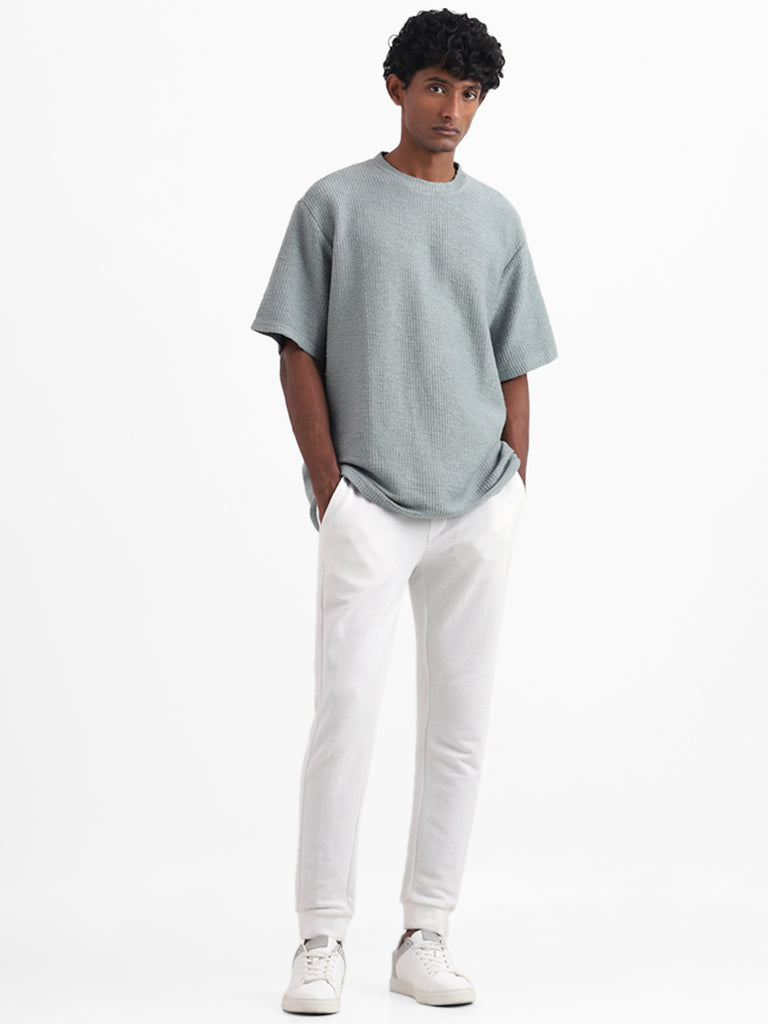Buy ETA Teal Solid Relaxed Fit T-Shirt from Westside