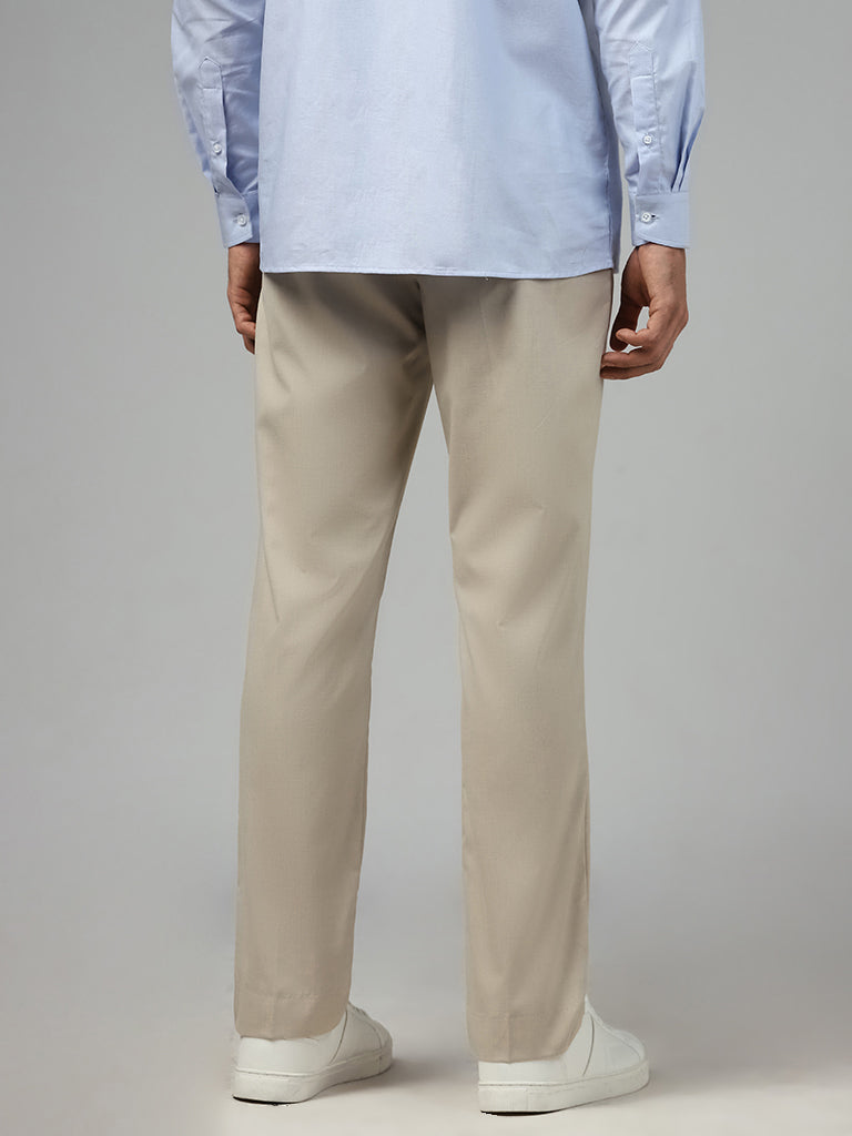 WES Formals Solid Light Beige Relaxed Fit Trousers