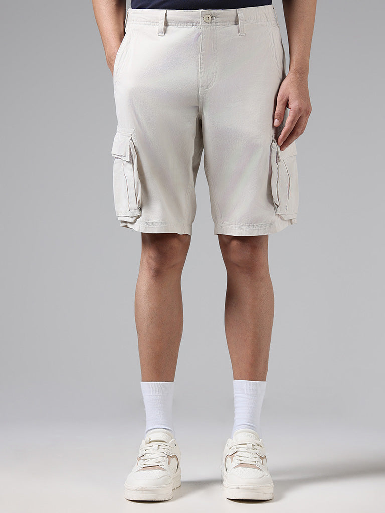 WES Casuals Solid Beige Mid-Rise Relaxed Fit Shorts