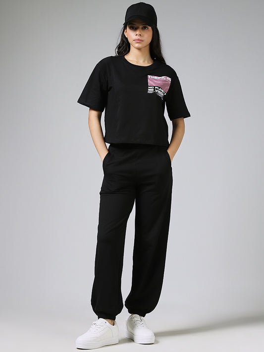 Studiofit Graphic Printed Black Over-Sized Crop T-Shirt