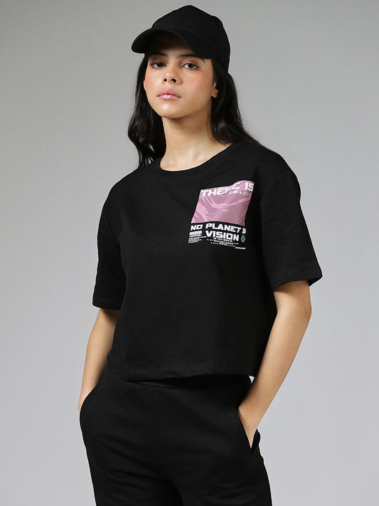 Studiofit Graphic Printed Black Over-Sized Crop T-Shirt