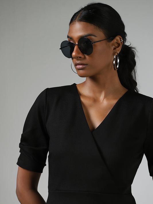 Wardrobe Black Solid V-Neck Top