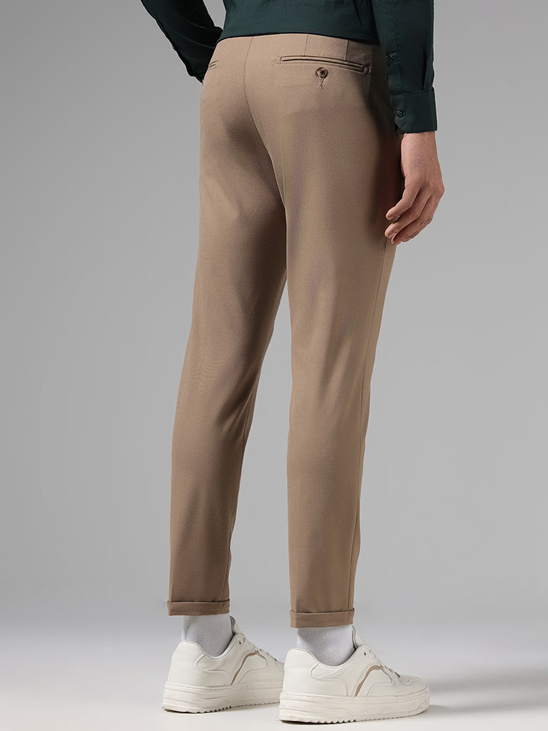 WES Formals Solid Dark Khaki Carrot Fit Trousers