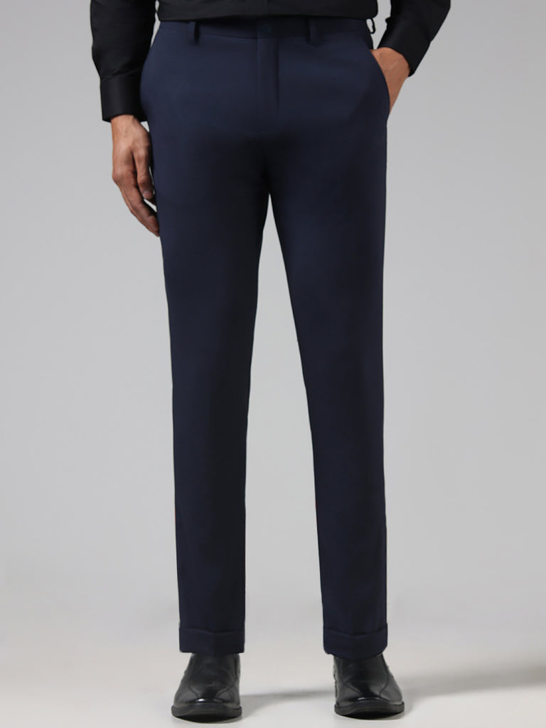 WES Formals Solid Navy Carrot Fit Trousers