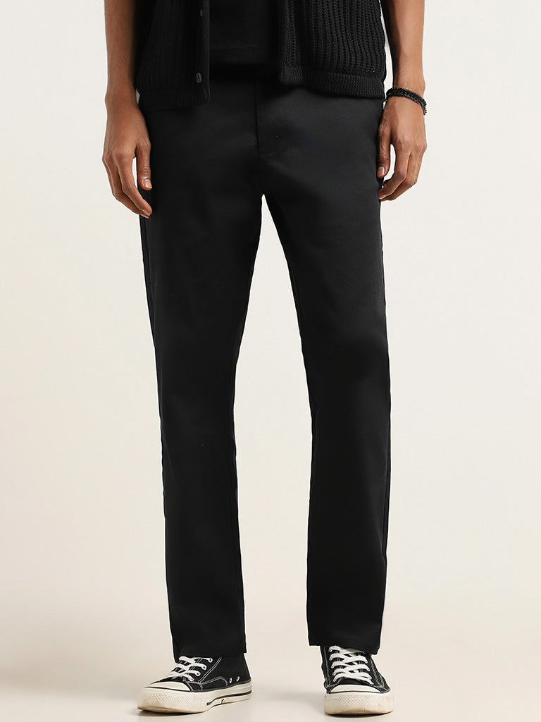 Buy Nuon Black Relaxed Fit Trousers from Westside