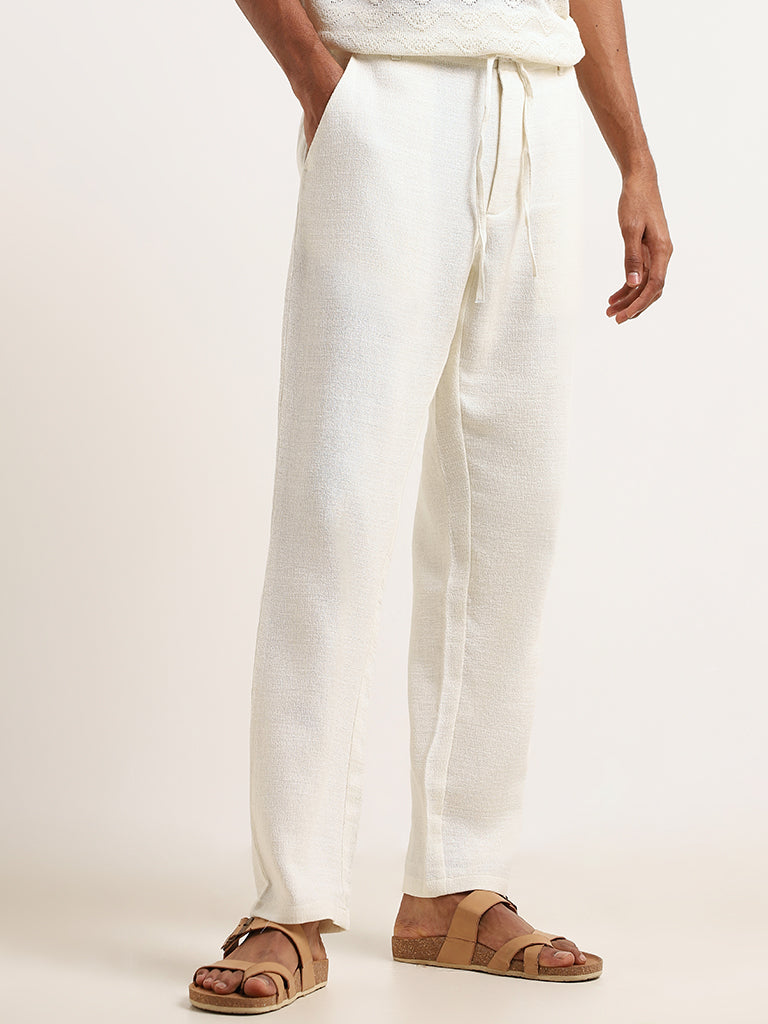 ETA Off-White Solid Cotton Blend Mid Rise Relaxed Fit Pants