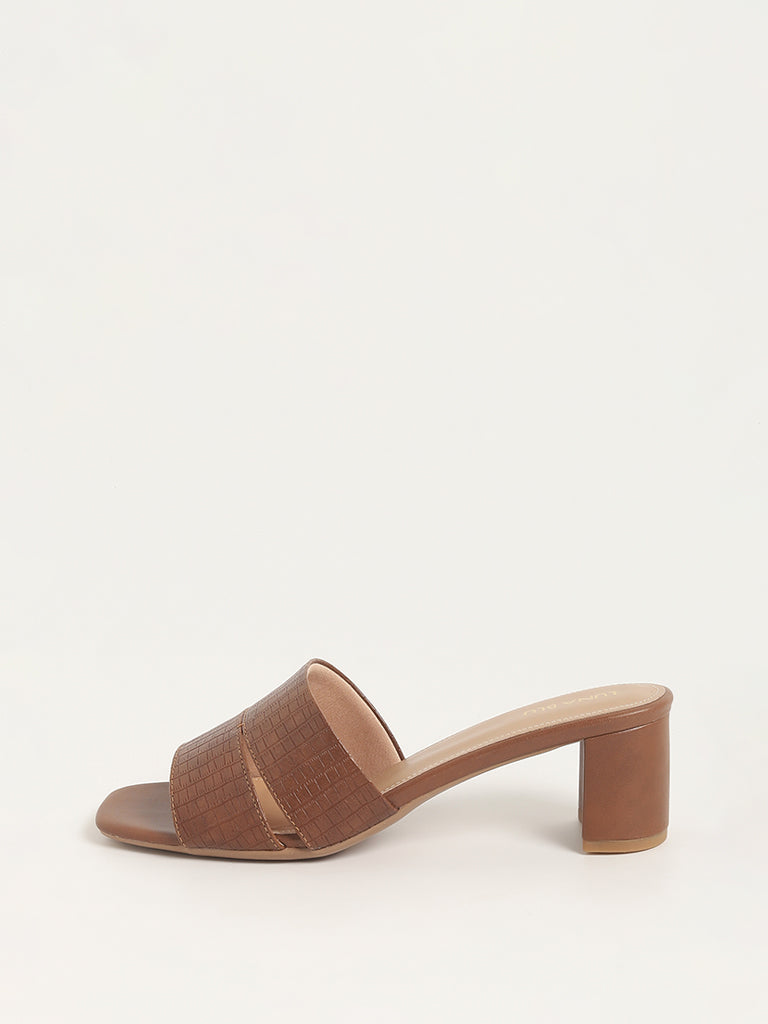 Buy SaintG Womens Tan Suede Leather Block Heels… at Amazon.in