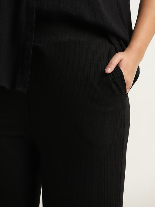 Gia Black Ribbed Mid Rise Flared Pants