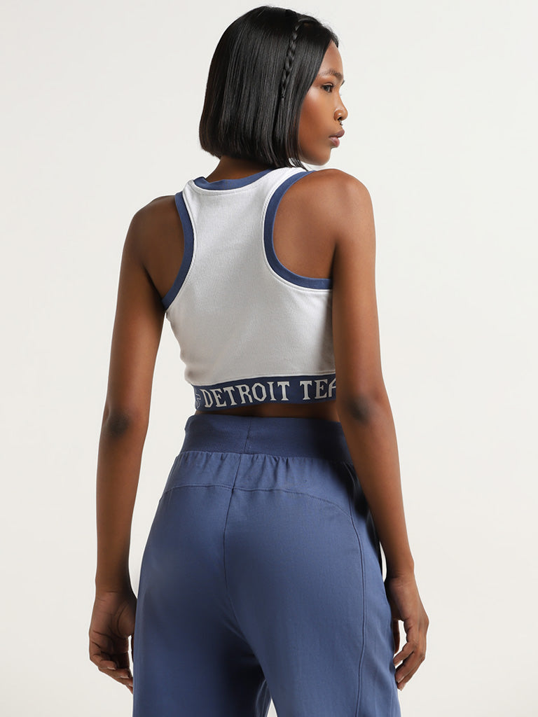 Studiofit White and Blue Text Printed Cotton Blend Crop Top