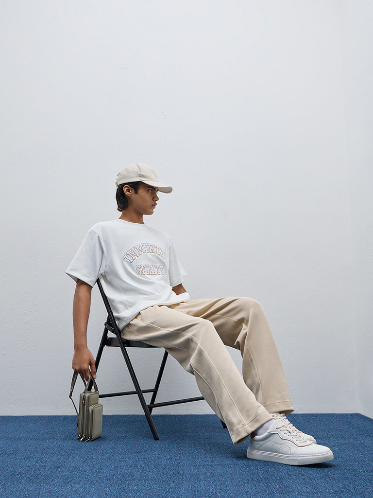 Westside Studiofit Men's Beige Relaxed-Fit Mid-Rise Cotton-Blend Track Pants for Sports Wear Full View