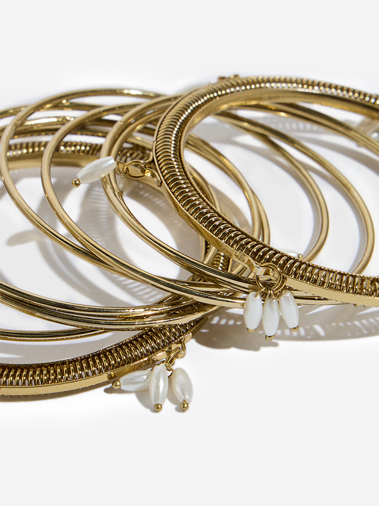 Westside Accessories Gold Rice Pearl Bangles Set - Pack of 9