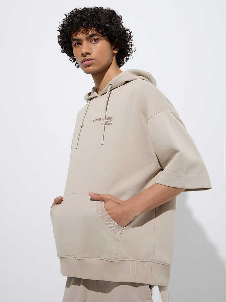 Westside Studiofit Men's Beige Text Print Relaxed-Fit Cotton-Blend Hoodie for Winter Wear Front View