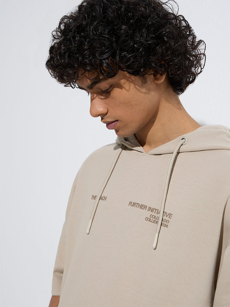 Westside Studiofit Men's Beige Text Print Relaxed-Fit Cotton-Blend Hoodie for Winter Wear Zoom View