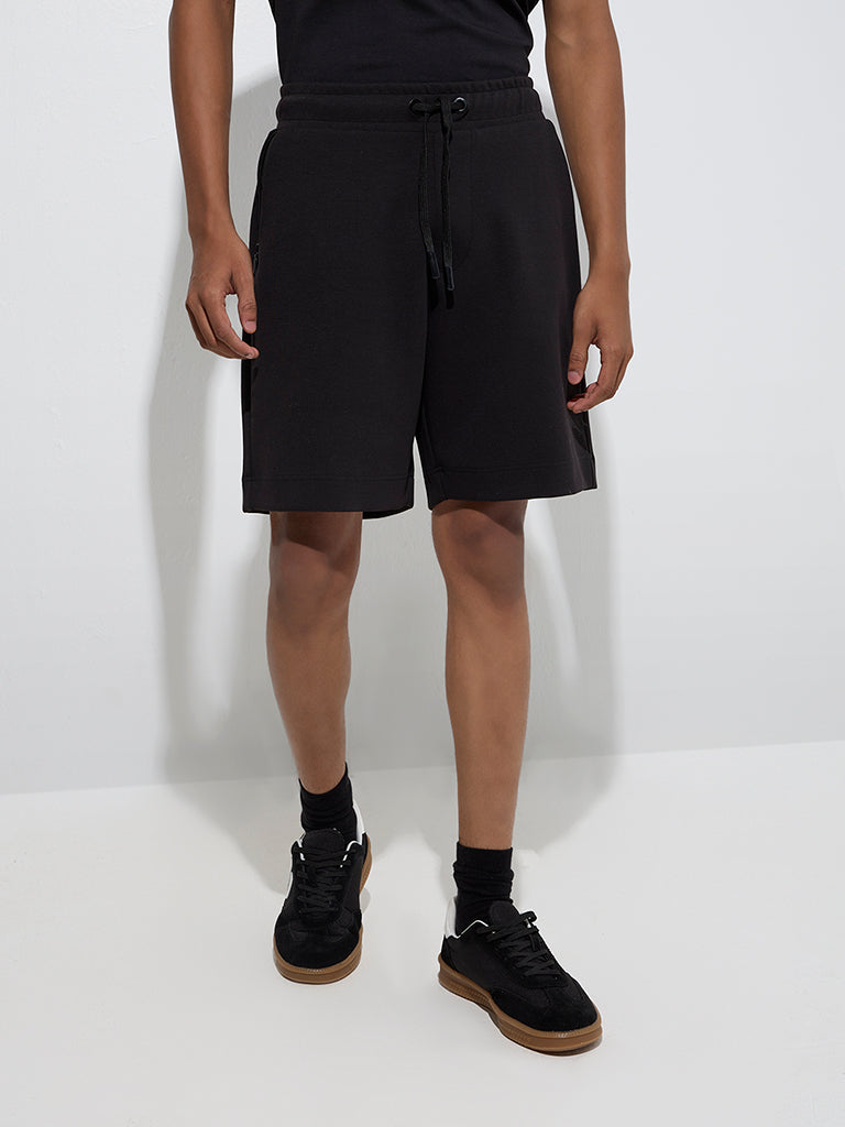 Westside Studiofit Men's Black Relaxed-Fit Mid-Rise Cotton-Blend Shorts for Sports Wear Front View