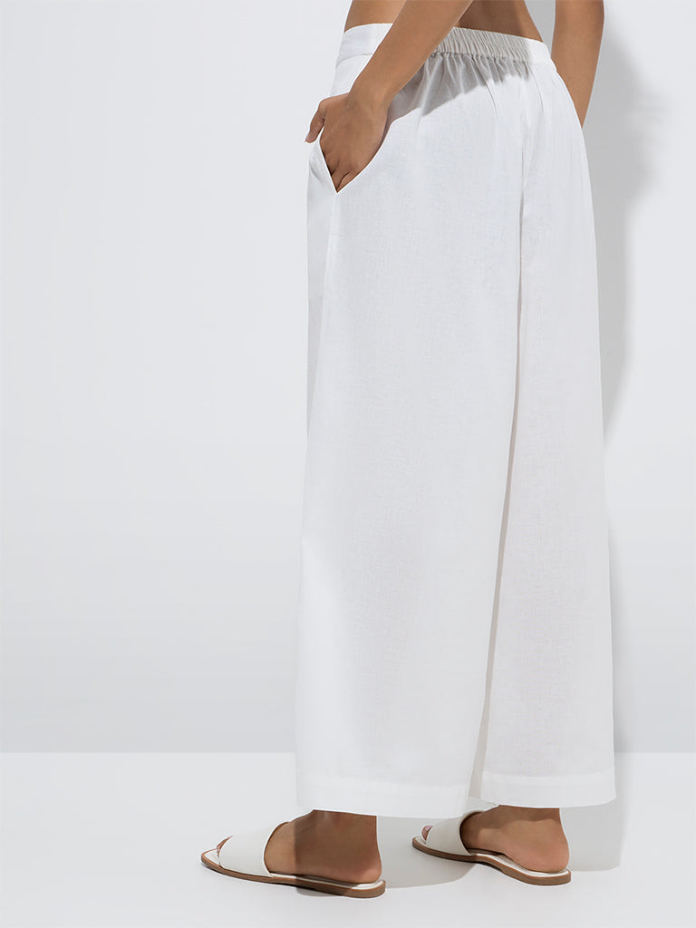 westisde Utsa Women's White Floral Embroidered Cotton-Blend Palazzos for Work Wear Back View