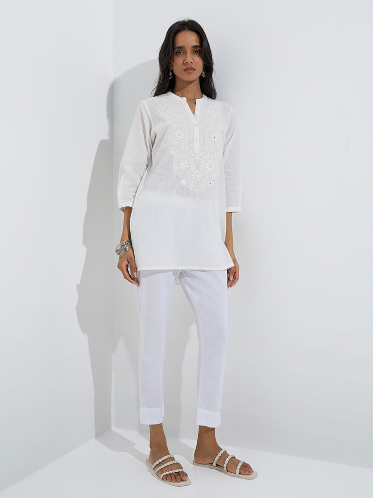 westisde Utsa Women's White Floral Embroidered Straight Cotton Kurti for Work Wear Full Model View