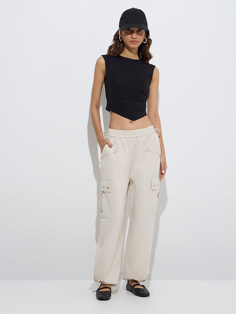 westisde Nuon Women's Light Beige Cargo-Style Mid-Rise Cotton Joggers for Casual Wear Full Model View