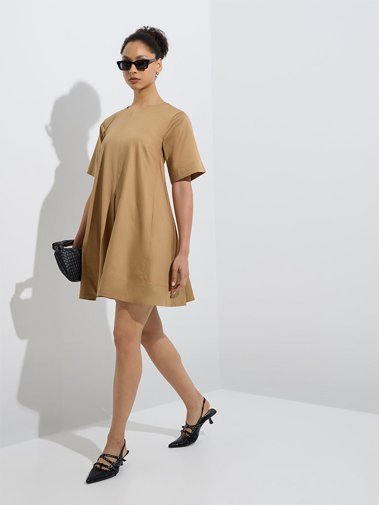 westisde Wardrobe Women's Beige Solid Cotton A-Line Dress for Work Wear Full Model View