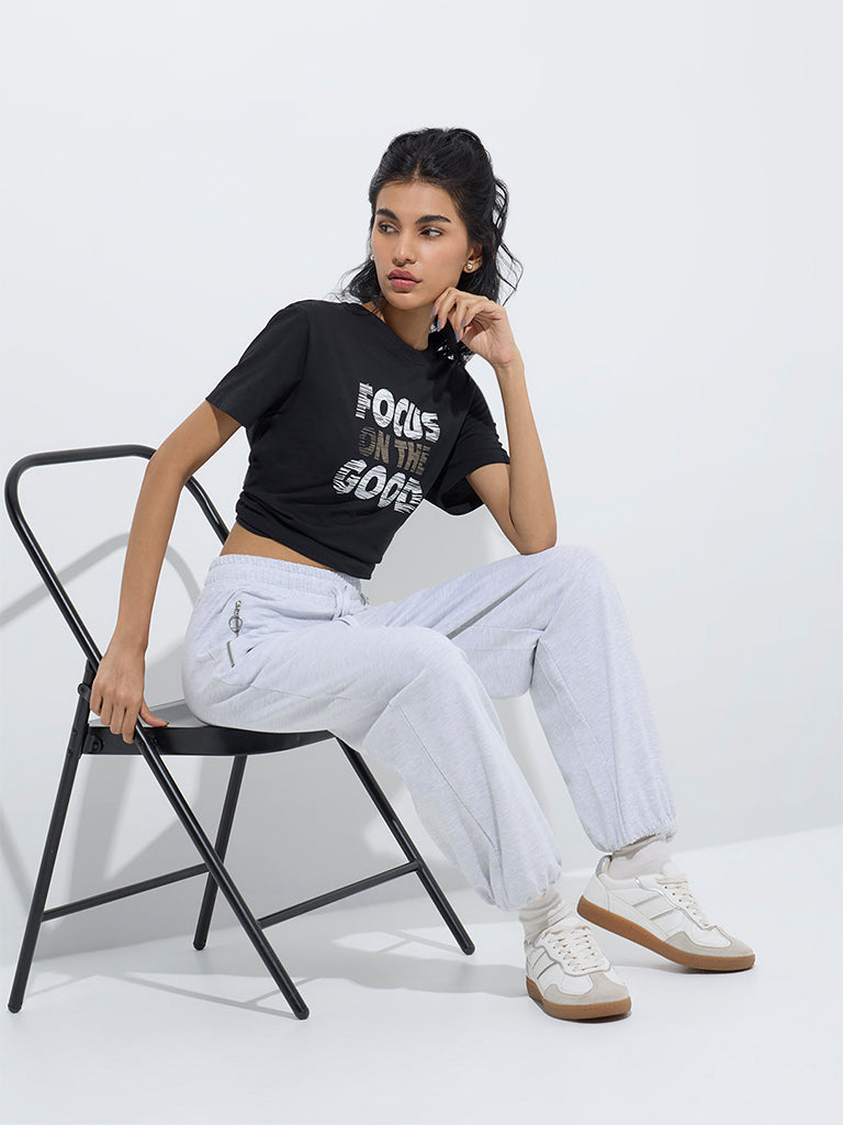 westisde Studiofit Women's Black Text Printed Cotton T-Shirt for Sports Wear Full Model View