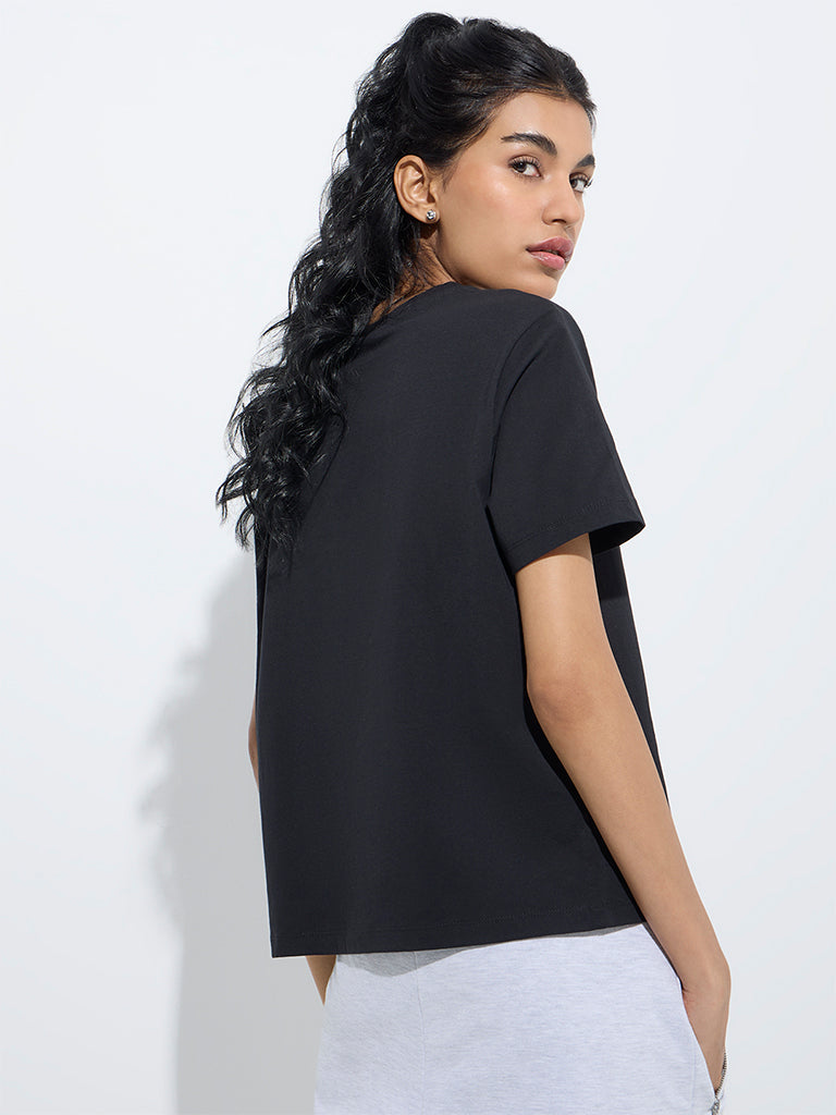 westisde Studiofit Women's Black Text Printed Cotton T-Shirt for Sports Wear Back View
