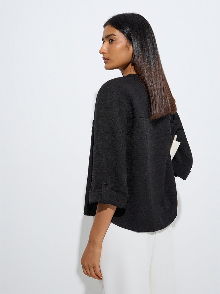 Westside Wardrobe Women's Black Solid Blouse for Work Wear Back View