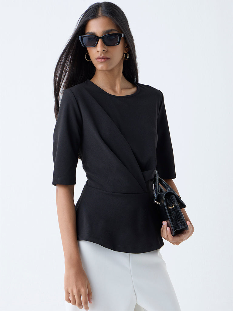 Westside Wardrobe Women's Black Solid Peplum Top for Work Wear Front View
