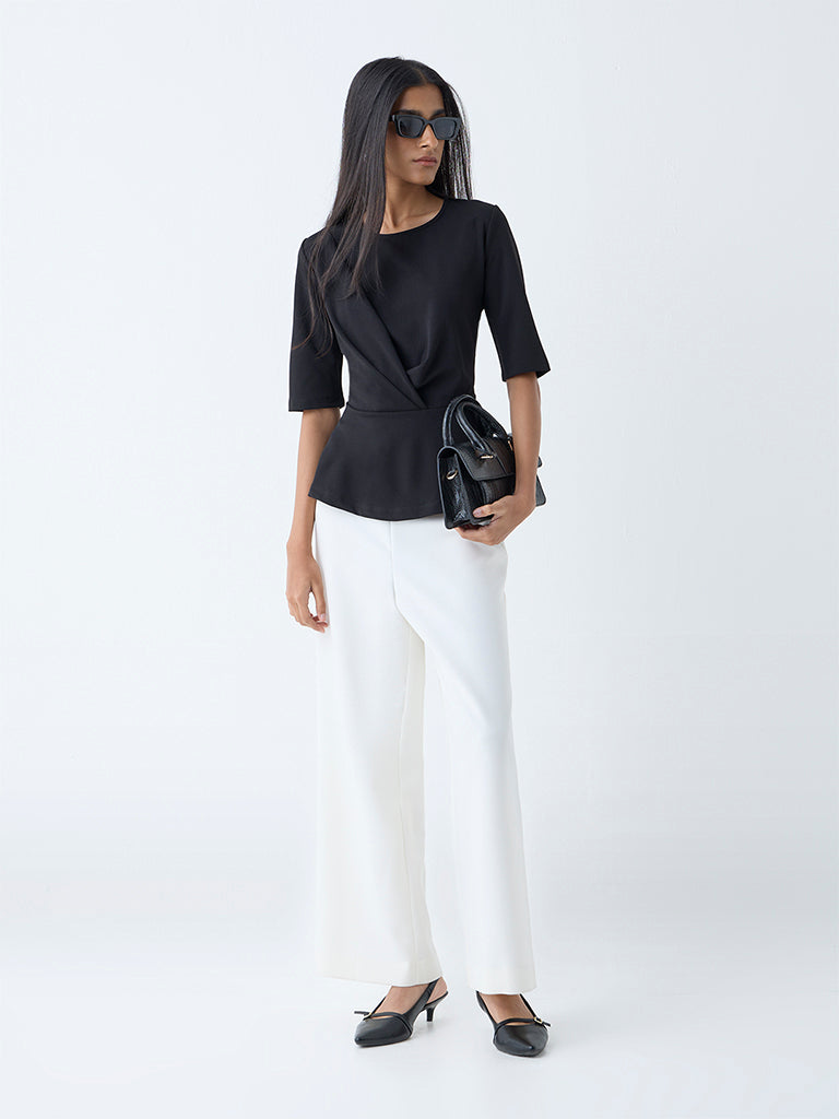 Westside Wardrobe Women's Black Solid Peplum Top for Work Wear Full View