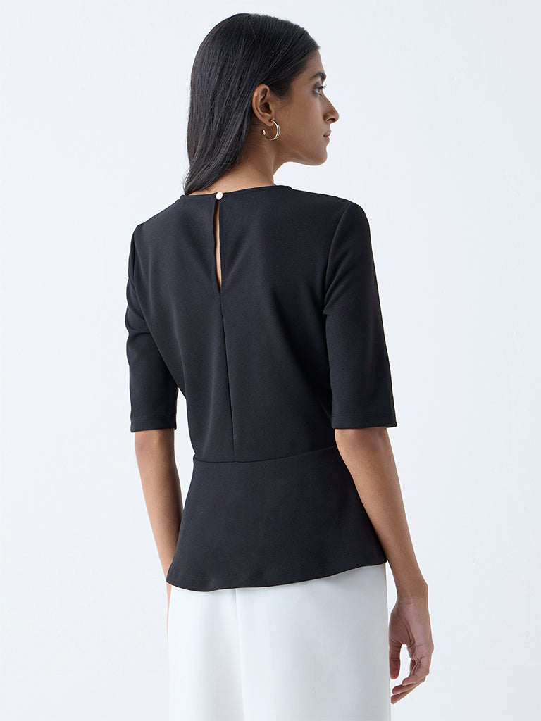 Westside Wardrobe Women's Black Solid Peplum Top for Work Wear Back View