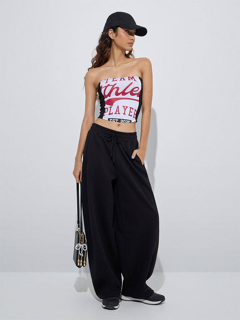 Westside Studiofit Women's Black Solid High-Rise Cotton Track Pants for Sports Wear Full Model View