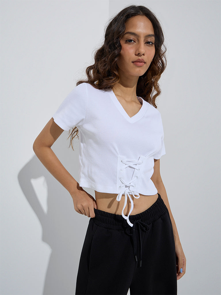 Westside Studiofit Women's White Criss-Cross Detailed Cotton-Blend Top for Sports Wear Front View