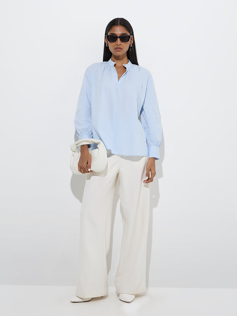 Westside Wardrobe Women's Light Blue Solid Blouse for Work Wear Full Model View