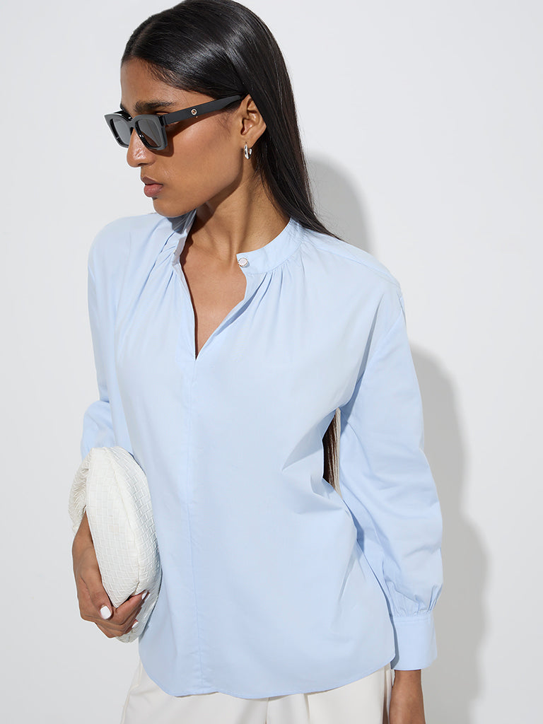Westside Wardrobe Women's Light Blue Solid Blouse for Work Wear Zoom View