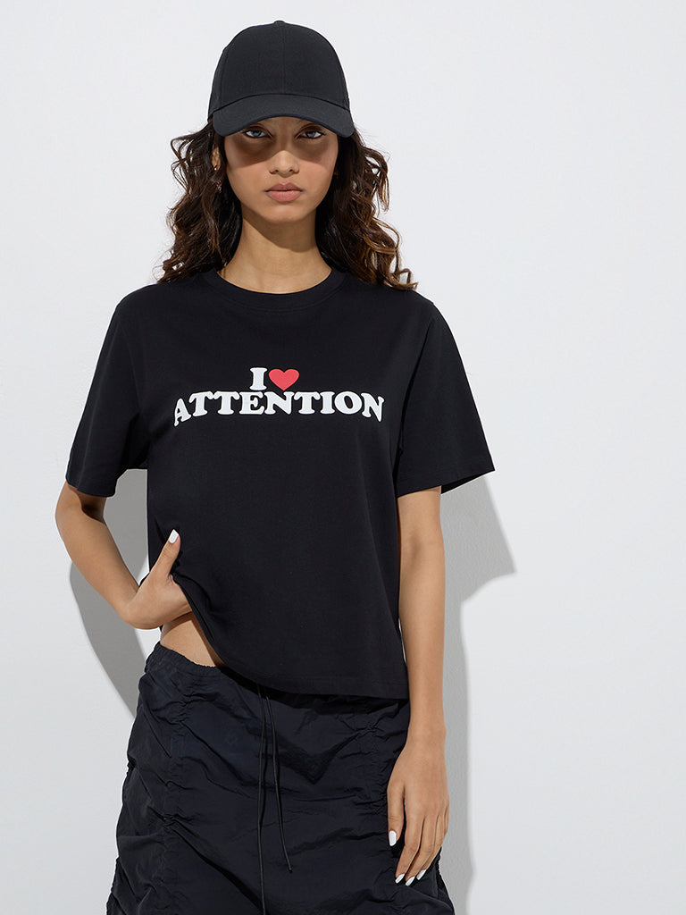 Westside Nuon Women's Black Text Printed Cotton T-Shirt for Casual Wear Front View