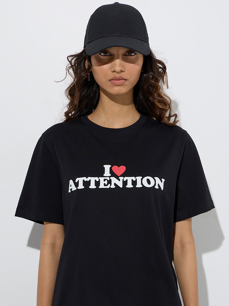 Westside Nuon Women's Black Text Printed Cotton T-Shirt for Casual Wear Zoom View