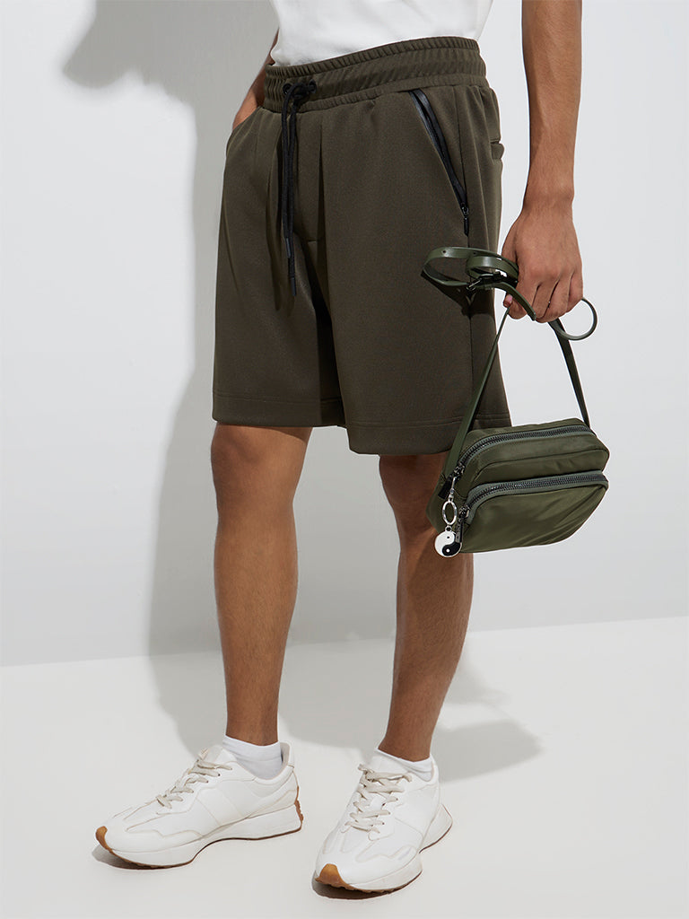 Westside Studiofit Men's Olive Solid Relaxed-Fit Mid-Rise Shorts for Sports Wear Front View