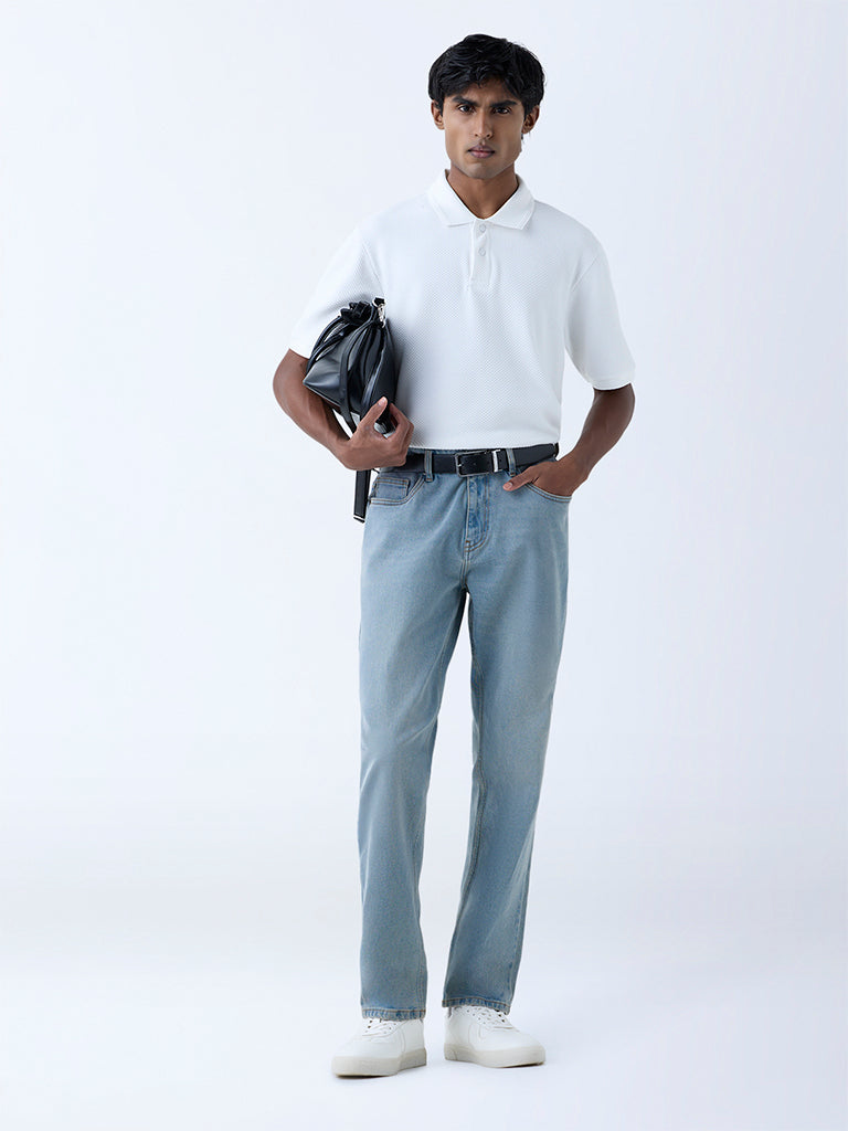 Westside WES Casuals Men's White Textured Relaxed-Fit Polo T-Shirt for Casual Wear Front View