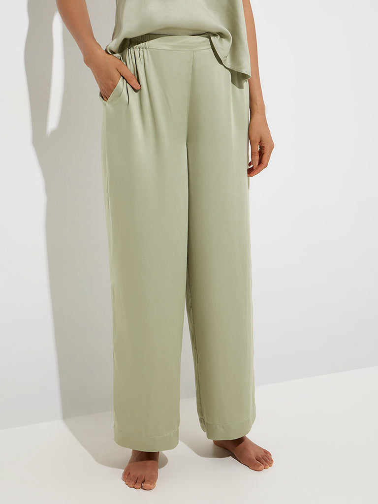 Westside Wunderlove Women's Sage Solid High-Rise Satin Pants for Casual Wear Front View