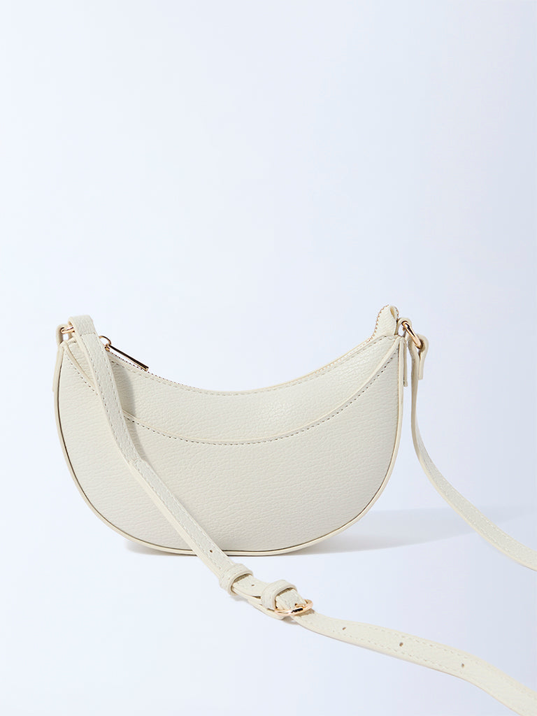 Westside Off-White Textured Saddle Bag