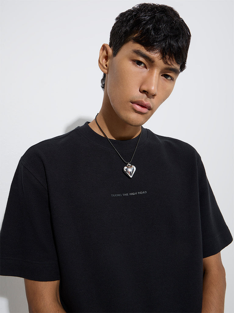 Westside Nuon Men's Black Text Detailed Relaxed-Fit Cotton T-Shirt for Casual Wear Zoomed View
