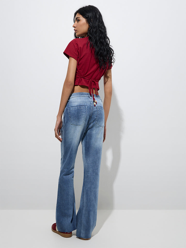Westside Nuon Women's Blue Faded Bootcut Mid-Rise Jeans for Casual Wear Back View