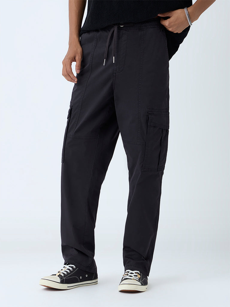 Westside Nuon Men's Black Relaxed-Fit Mid-Rise Cotton-Blend Cargo Pants for Casual Wear Front view
