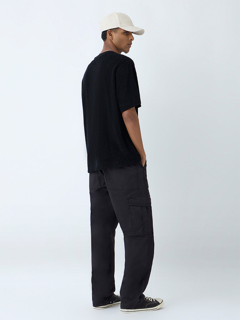 Westside Nuon Men's Black Relaxed-Fit Mid-Rise Cotton-Blend Cargo Pants for Casual Wear Back View