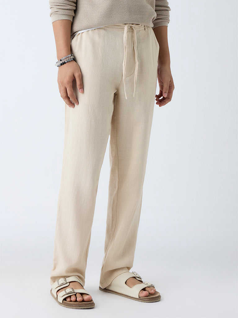 Westside ETA Men's Beige Relaxed-Fit Mid-Rise Cotton-Blend Chinos for Casual Wear Front View