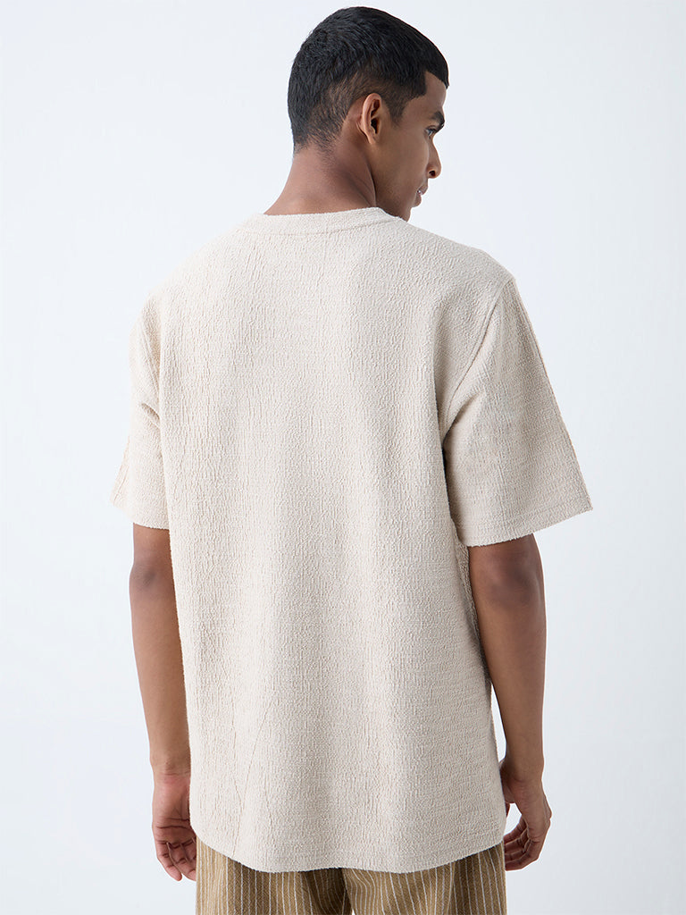 Westside ETA Men's Beige Self-Textured Relaxed-Fit Cotton-Blend T-Shirt for Casual Wear Back View