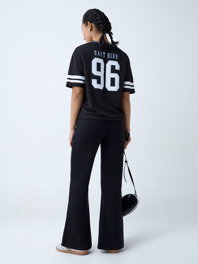 Westside Studiofit Women's Black Bootcut High-Rise Pants for Sports Wear Back View