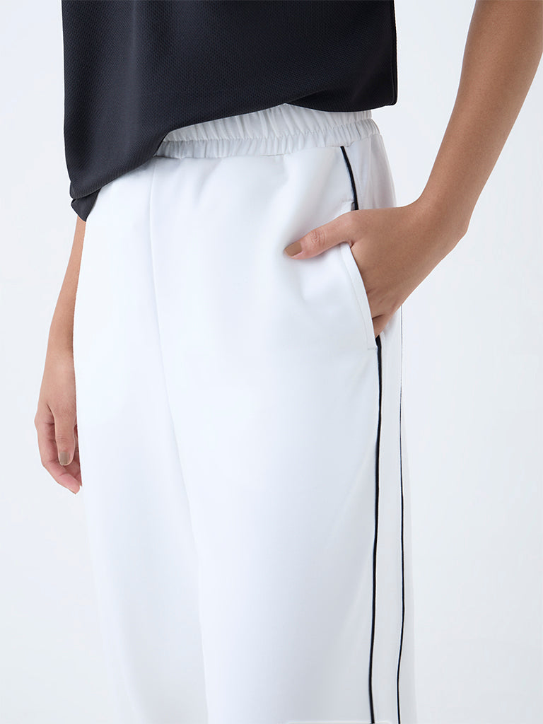 Westside Studiofit Women's White High-Rise Track Pants for Casual Wear Zoomed View