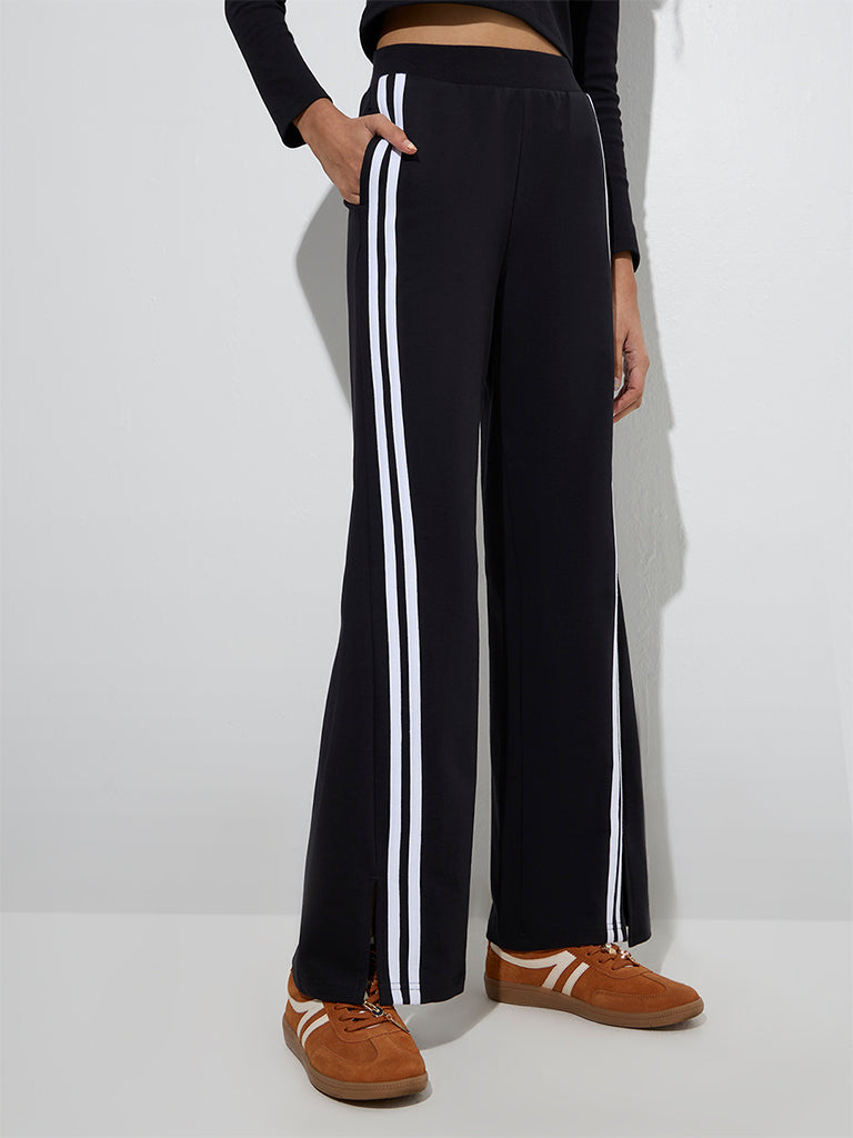 Westside Studiofit Women's Black Striped High-Rise Cotton-Blend Track Pants for Sports Wear Front View