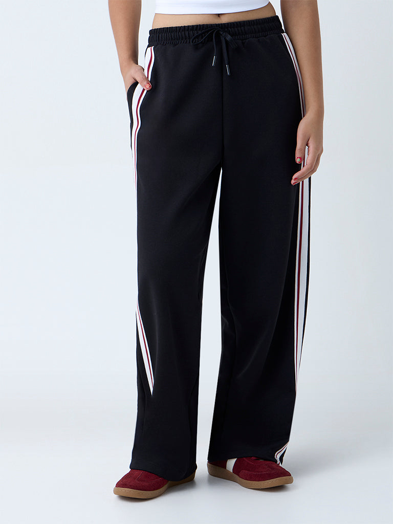 Westside Studiofit Women's Black Stripe High-Rise Track Pants for Sports Wear Front View