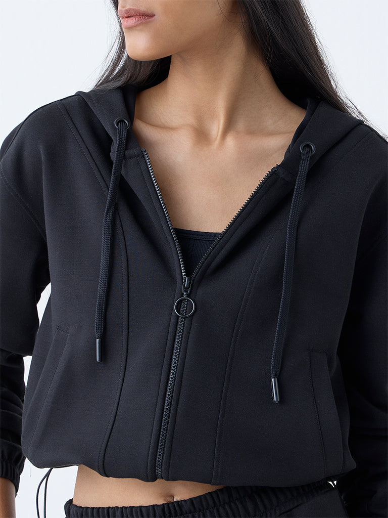 Westside Studiofit Women's Black Solid Hooded Jacket for Sports Wear Zoomed View